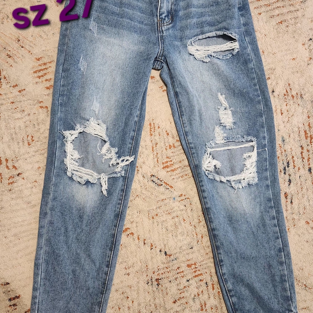 Distressed Blue Jeans